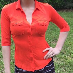 Candies tangerine colored top